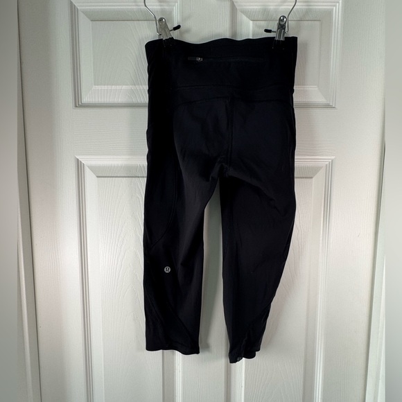 Lululemon Black Capri Reflective Mesh Pockets Size 4 Womens Running - Picture 6 of 8